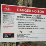 Danger Poison sign in nature