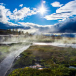 Mountain and river landscape with water mist